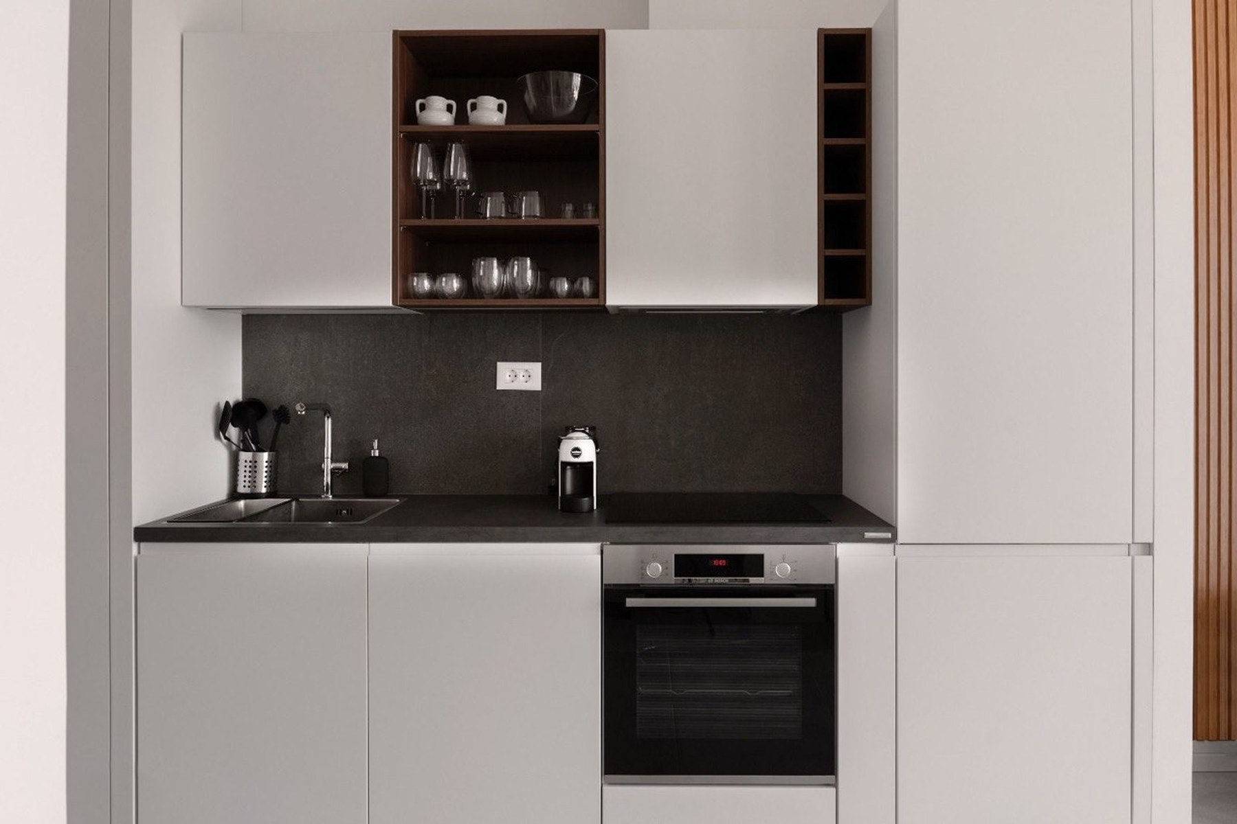 Marina Village 52 m² apartment, fitted kitchenette with oven and storage