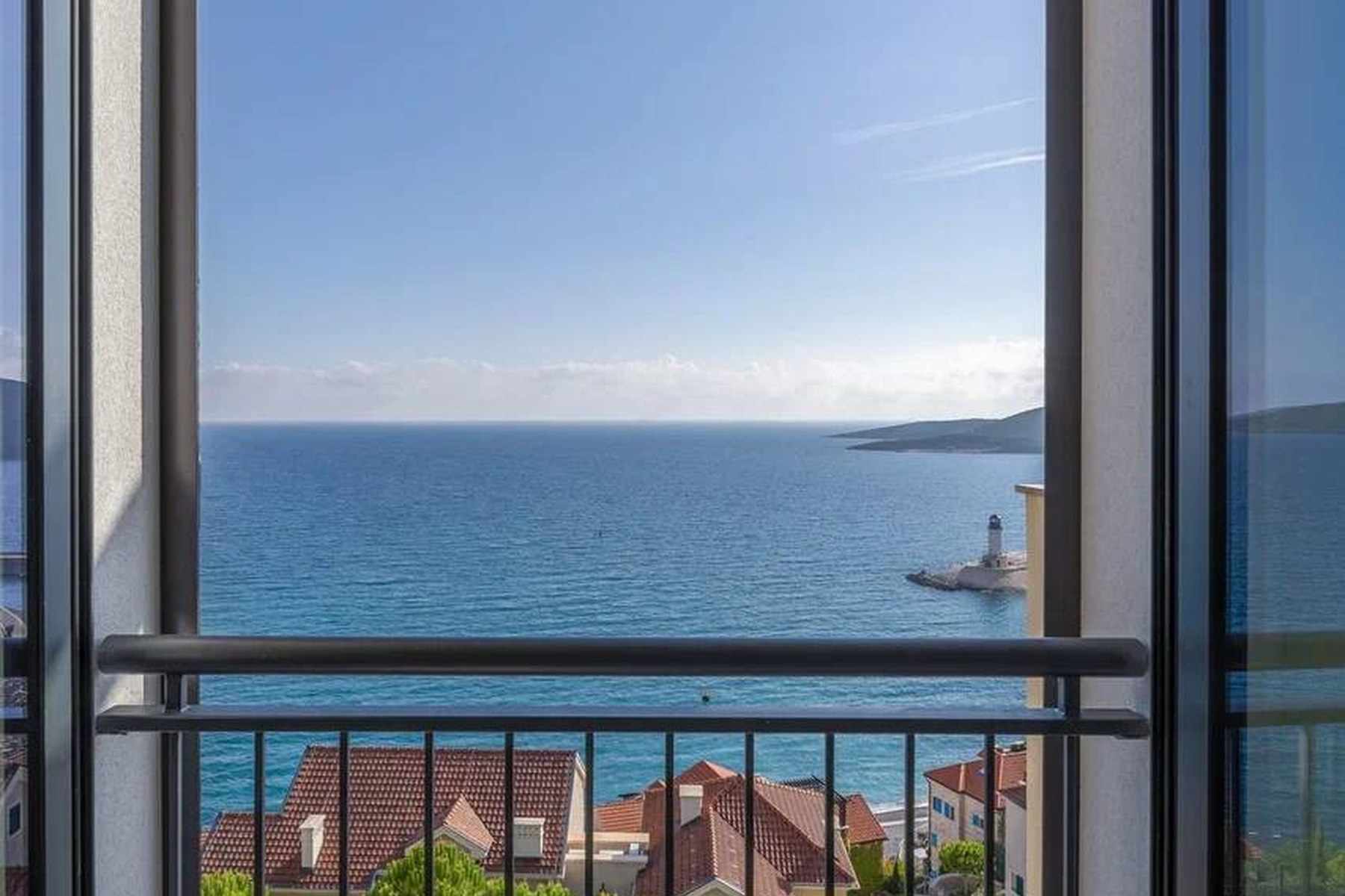 Marina Village 94 m² top-floor apartment, view from the balcony onto the Adriatic and the marina