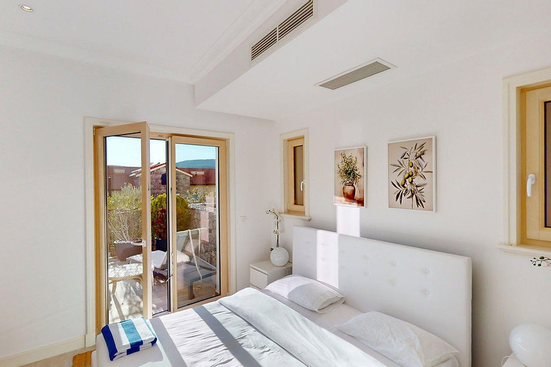 Marina Village garden one-bedroom residence, bedroom with direct terrace access