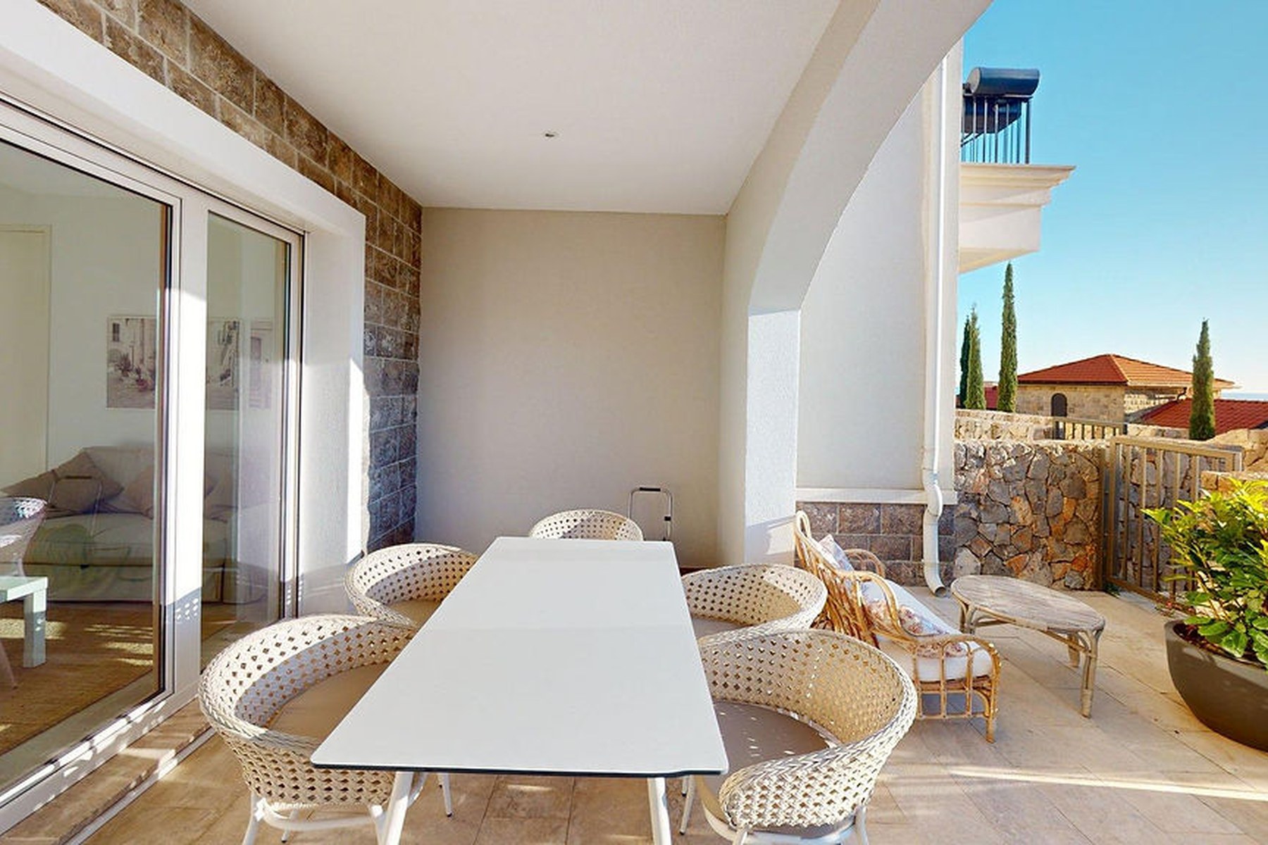 Marina Village garden one-bedroom residence, covered outdoor dining terrace