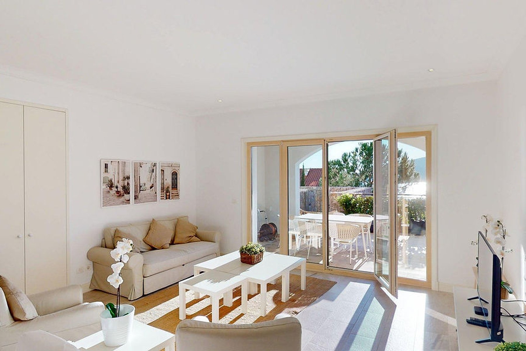 Marina Village garden one-bedroom residence, second view of the living area with garden access